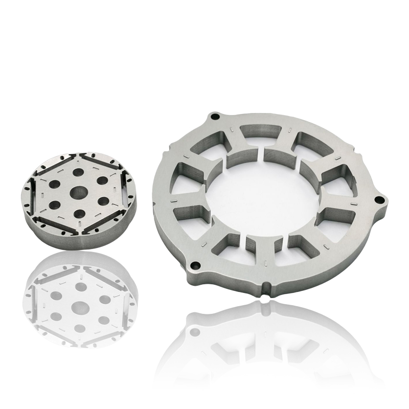 Conas a bhíonn tionchar ag fachtóir tiús agus cruachta lannaithe i gCroílár Motor Stator ar éifeachtúlacht fuinnimh, ar chaillteanais reatha eddy, agus ar leibhéil torainn oibriúcháin?